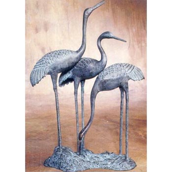 Trois grues sur base bronze