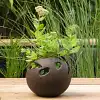 Pot de fleur extérieur boule en fonte