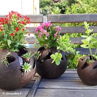 Pot de fleur extérieur boule en fonte