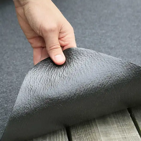 envers tapis plancha