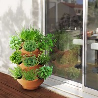 Pot en terre cuite boule ajouré 38cm