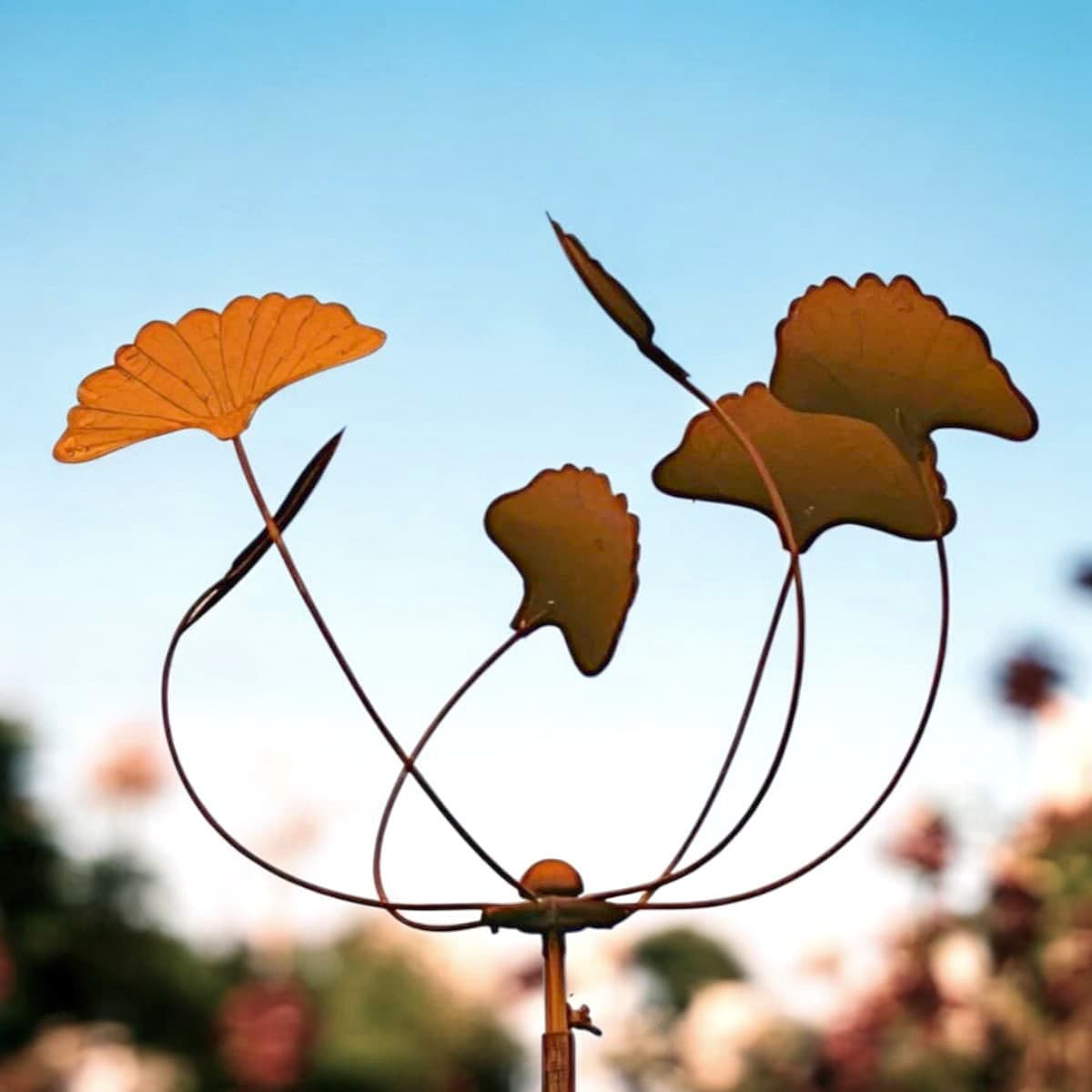 Éolienne de jardin tulipe gingko en fer rouillé Éolienne de jardin tulipe gingko en fer rouillé