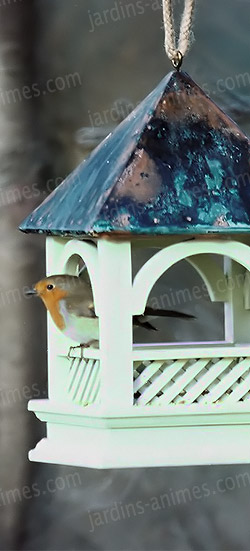 Magnifique mangeoire oiseau en bois et toit en cuivre Magnifique mangeoire oiseau en bois et toit en cuivre