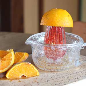 Presse orange manuel en verre robuste