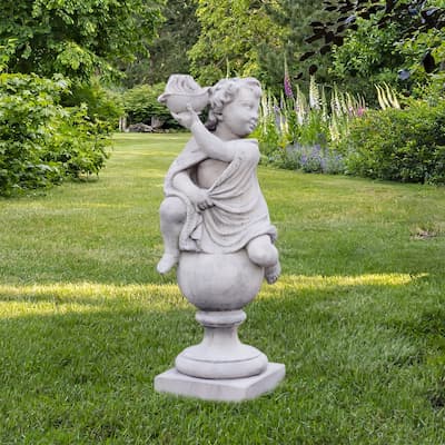Statue ange sur colonne boule et son coquillage