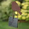 Oiseau sur tige décoratif en métal rouillé