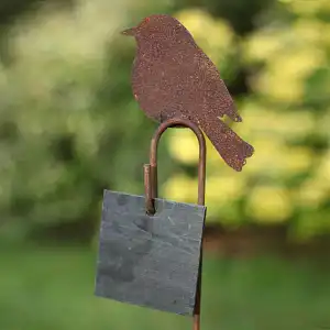 Oiseau sur tige décoratif en métal rouillé
