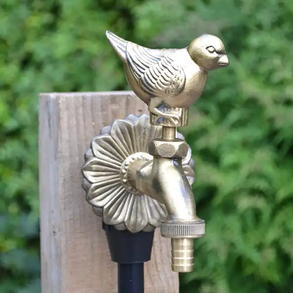 robinet oiseau laiton dore