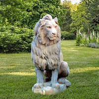 Statue de lion assis en pierre composite - tÃªte Ã gauche